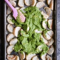 Take plain roasted turnips to the next level by tossing them in this lemon & garlic turnip greens pesto for a new spin on the classic root vegetable! | Fed & Fit