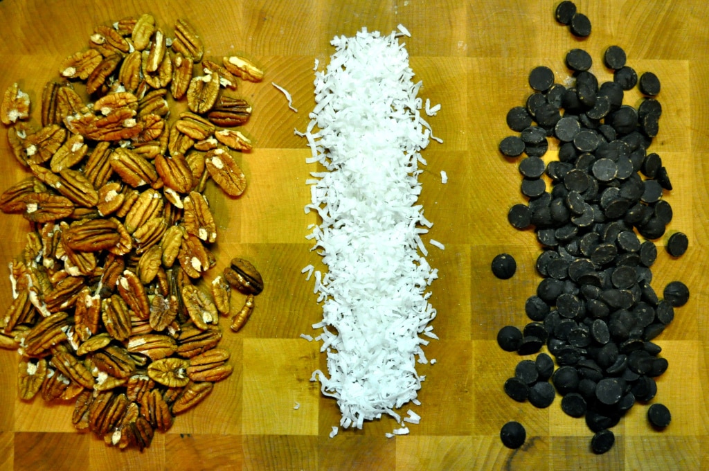 overhead view of ingredients for dark chocolate chili pecan clusters