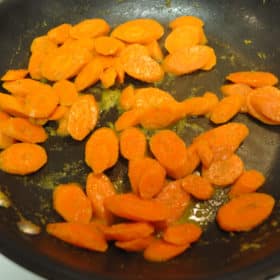cumin lime carrots in a skillet