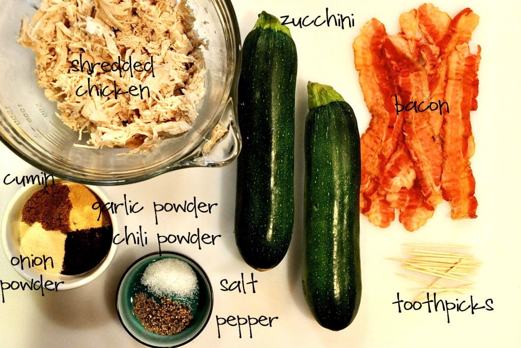 overhead view of ingredients to make a bacon wrapped stuffed zucchini