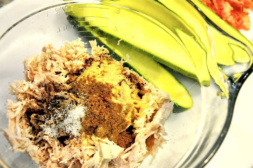 clear glass bowl of chicken and spices