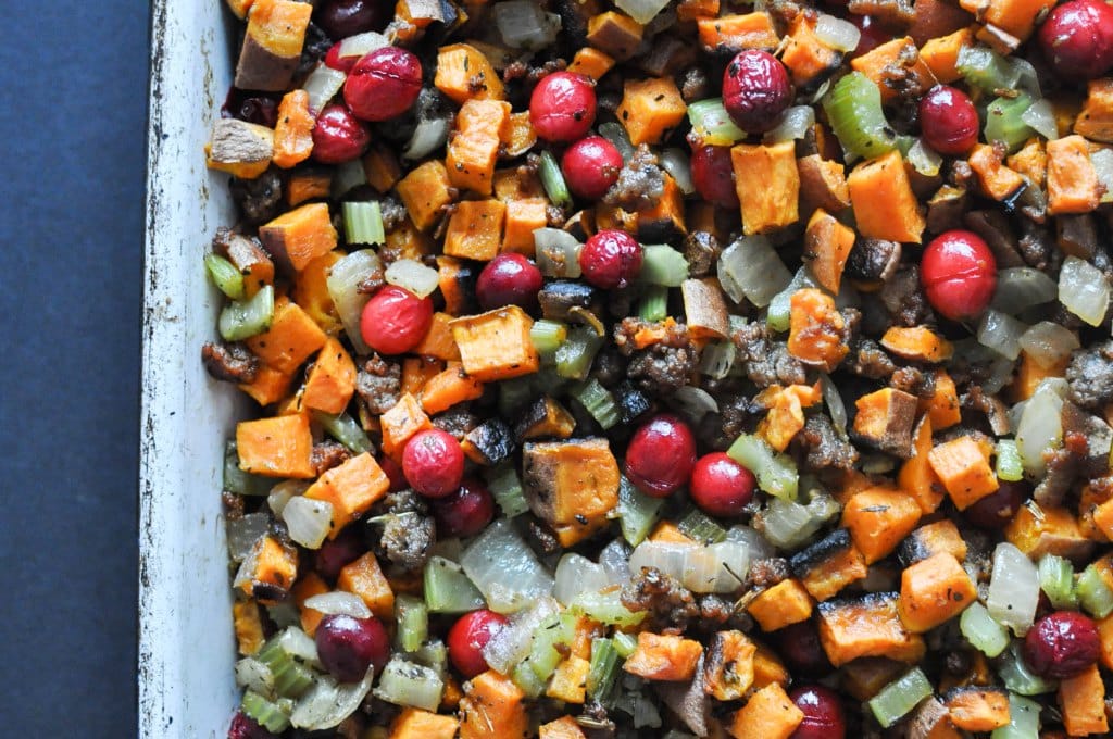 pan full of paleo stuffing with diced sweet potatoes, celery, onion, sausage, and cranberries