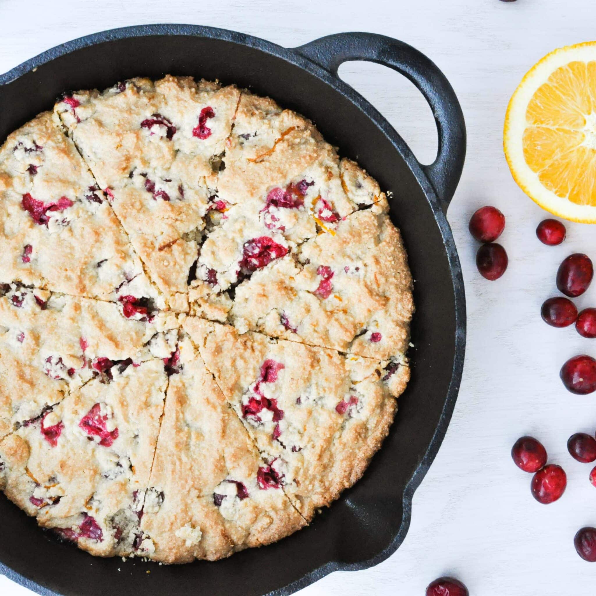 overhead view of cranberry orange scones in a skillet