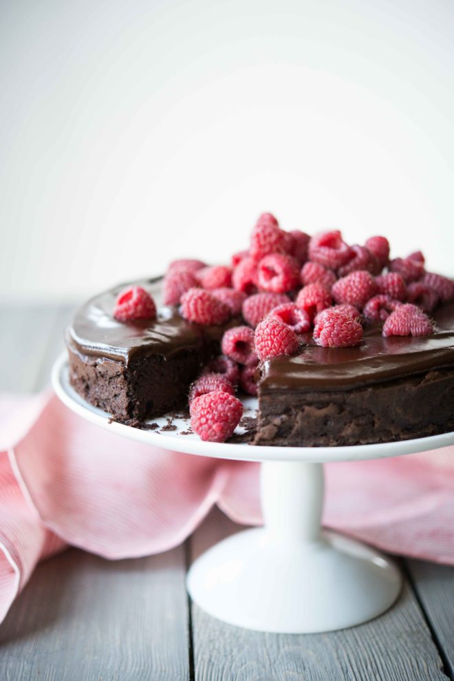 Flourless Chocolate Cake topped with raspberries