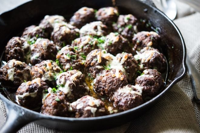 french onion skillet meatballs in a cast iron pan