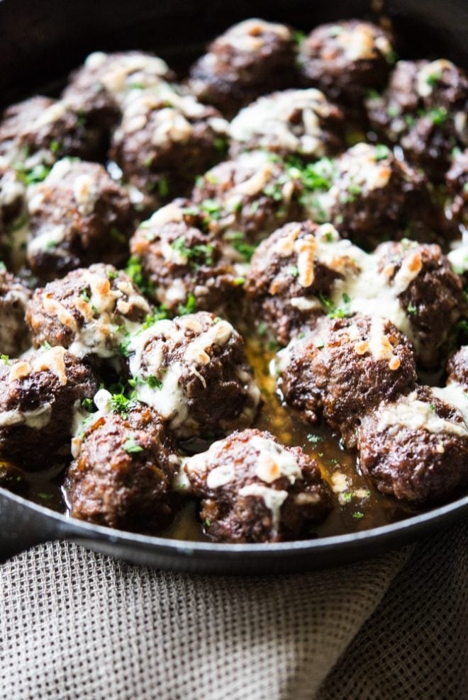 french onion skillet meatballs in a cast iron pan