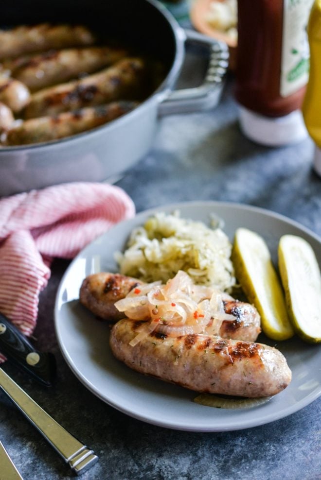 Gluten Free Hard Cider Brats with Caramelized Onions | Fed & Fit