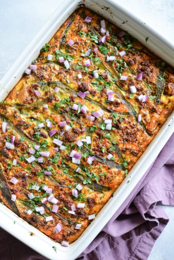 overhead view of a white casserole dish of Chile relleno breakfast casserole