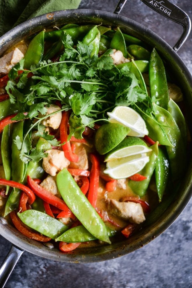 This Thai green curry comes together in just 3 easy steps with chicken, coconut milk, curry paste, and a healthy dose of vegetables for an easy Paleo weeknight meal! | Fed & Fit