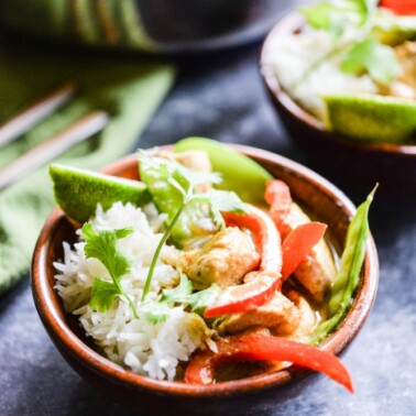 This Thai green curry comes together in just 3 easy steps with chicken, coconut milk, curry paste, and a healthy dose of vegetables for an easy Paleo weeknight meal! | Fed & Fit