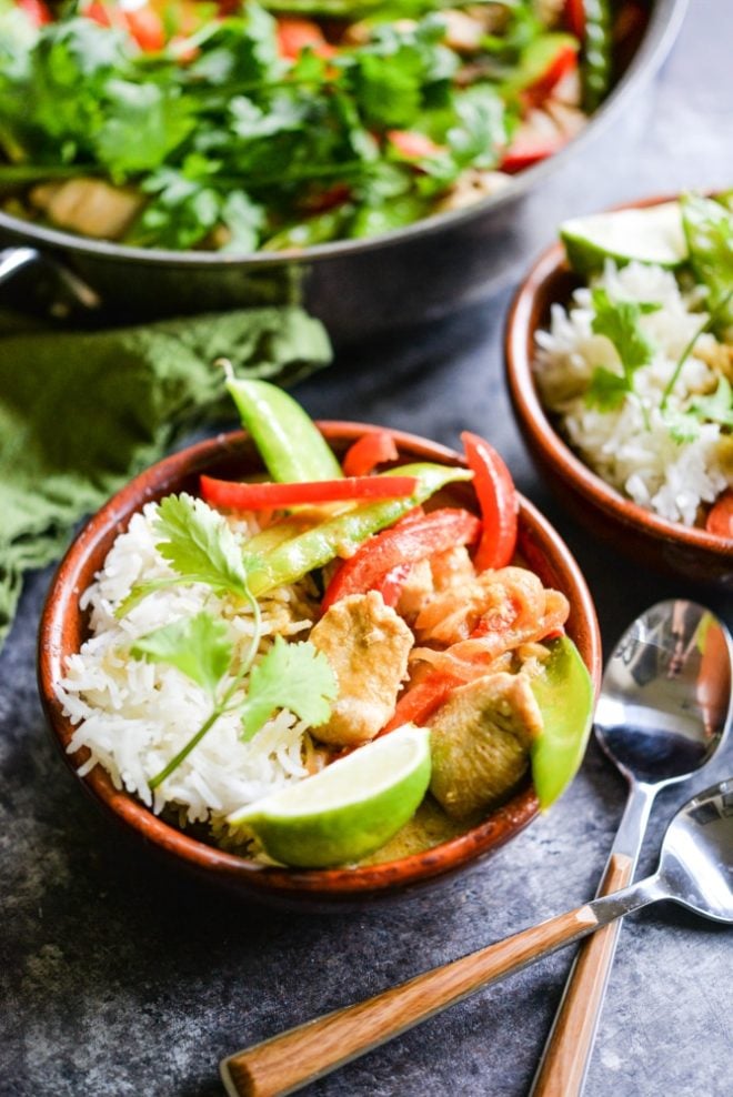 This Thai green curry comes together in just 3 easy steps with chicken, coconut milk, curry paste, and a healthy dose of vegetables for an easy Paleo weeknight meal! | Fed & Fit