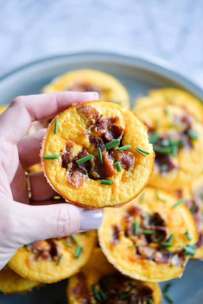 These butternut squash egg muffins are the perfect freezable, make-ahead breakfast for the week! The perfect combo of sweetness from the squash and salt from the bacon, these portable breakfast are also gluten free, Paleo, and Whole 30 friendly!
