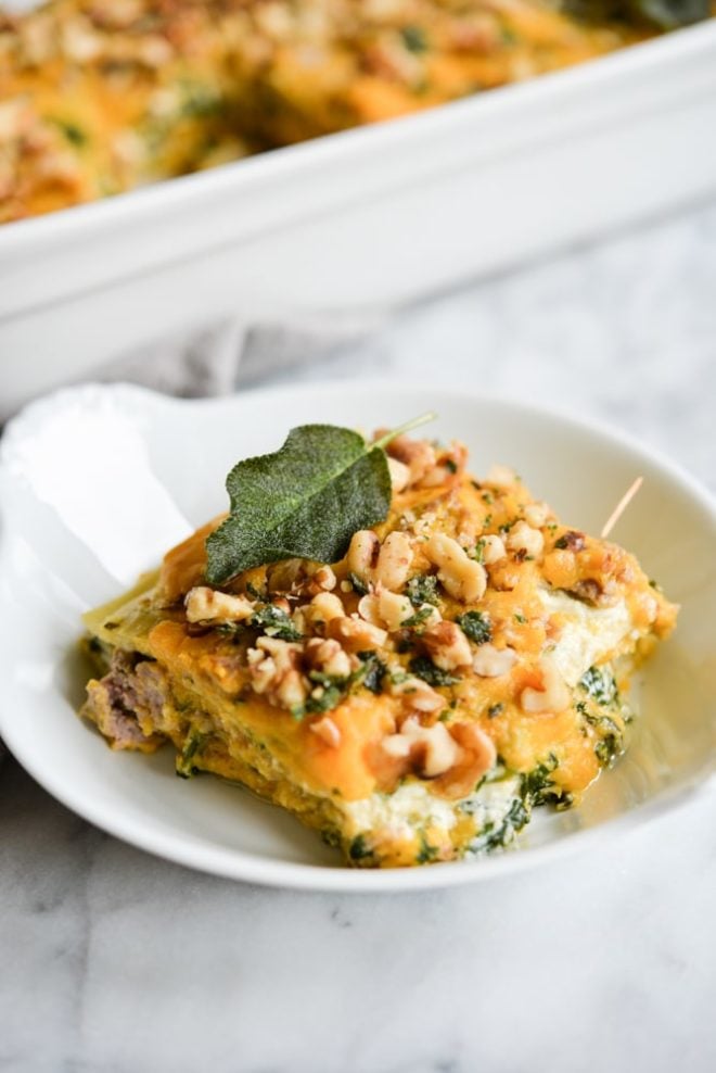 This Paleo & gluten free butternut squash lasagna is absolute fall comfort food, featuring a creamy squash puree, ricotta (DF option included), and savory fried sage.