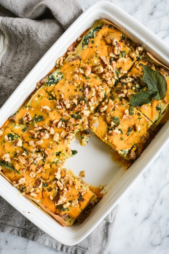 This Paleo & gluten free butternut squash lasagna is absolute fall comfort food, featuring a creamy squash puree, ricotta (DF option included), and savory fried sage.