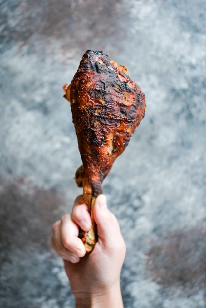 These BBQ turkey legs are roasted in the oven to juicy perfection and come together quickly with just a few ingredients for the perfect change-up to your normal Thanksgiving protein! | Fed & Fit