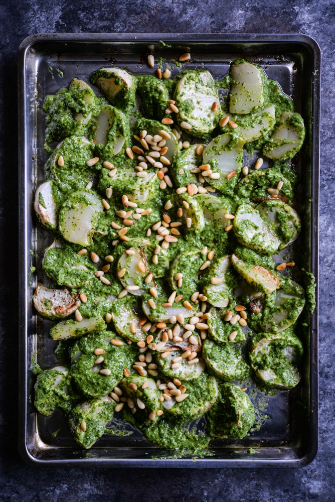 Take plain roasted turnips to the next level by tossing them in this lemon & garlic turnip greens pesto for a new spin on the classic root vegetable! | Fed & Fit