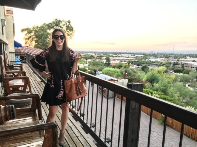 woman smiling on a terrace