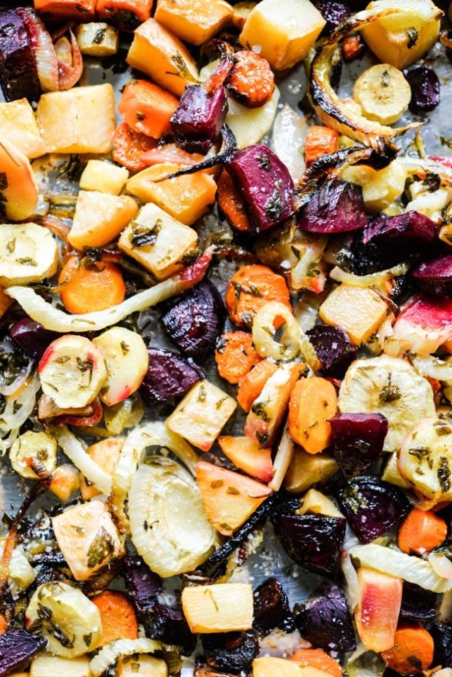 This winter root veggie roast combines carrots, parsnips, beets, fennel, and more until crisp with a flavorful lemon-parsley vinaigrette. It is the perfect way to enjoy the season's bounty of root vegetables!