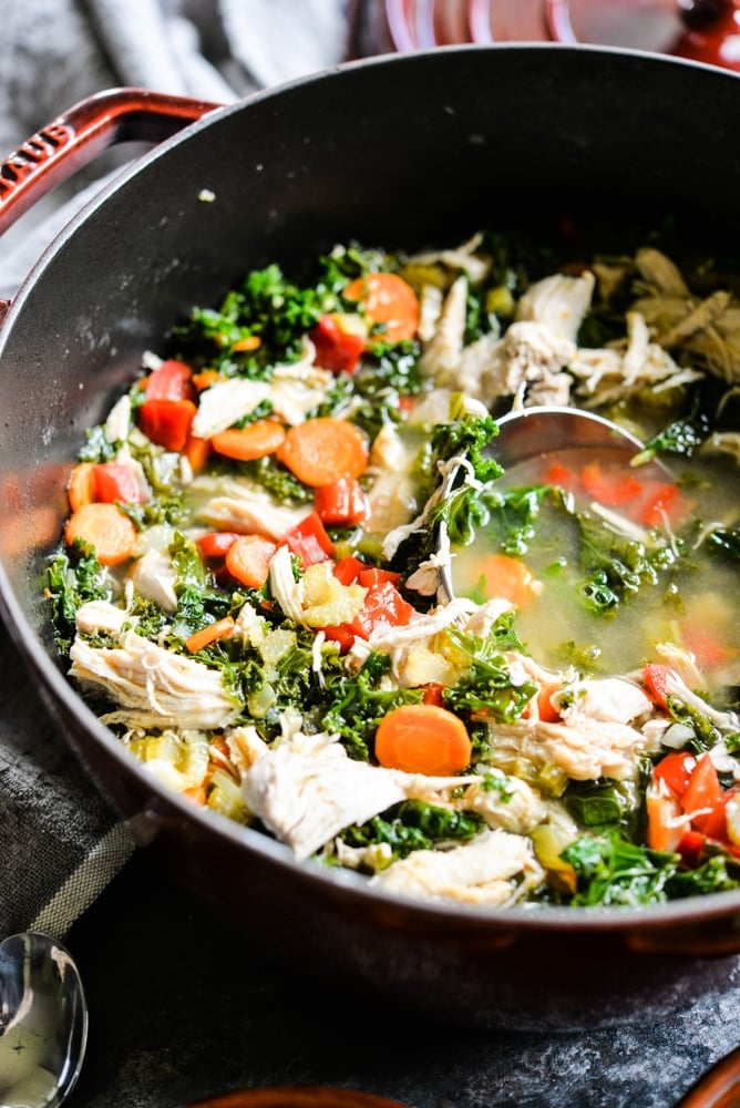 leftover shredded chicken soup with veggies in a pot