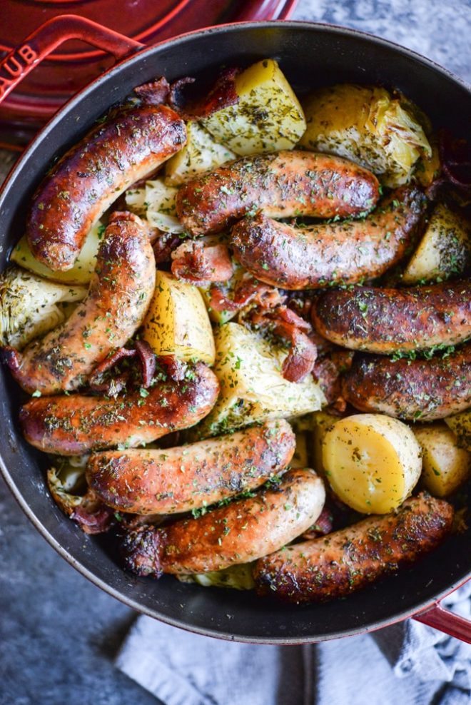 Dublin Coddle - sausage, potatoes, bacon, and cabbage in a red cast iron pot