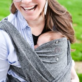 woman wearing a baby in a carrier