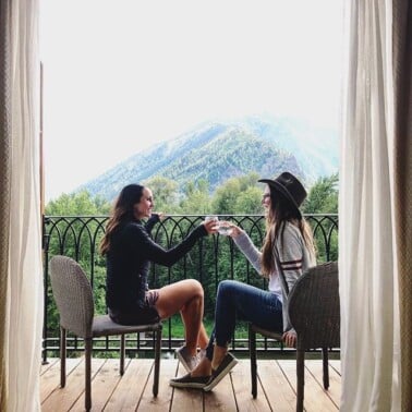 two women doing a cheers in Leaveworth, WA