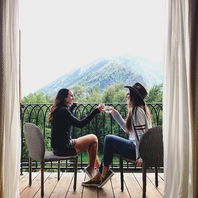 two women doing a cheers in Leavenworth, WA