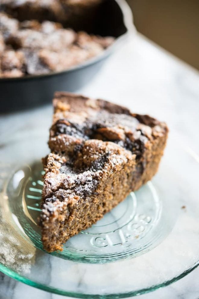 one piece of chocolate chai swirl coffee cake on a green glass plate