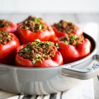 overhead view of Curried Beef & Butternut Squash Stuffed Peppers in a skillet