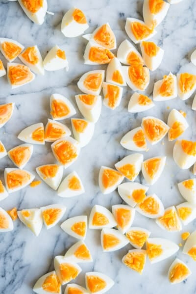 chopped hard boiled eggs on a marble board