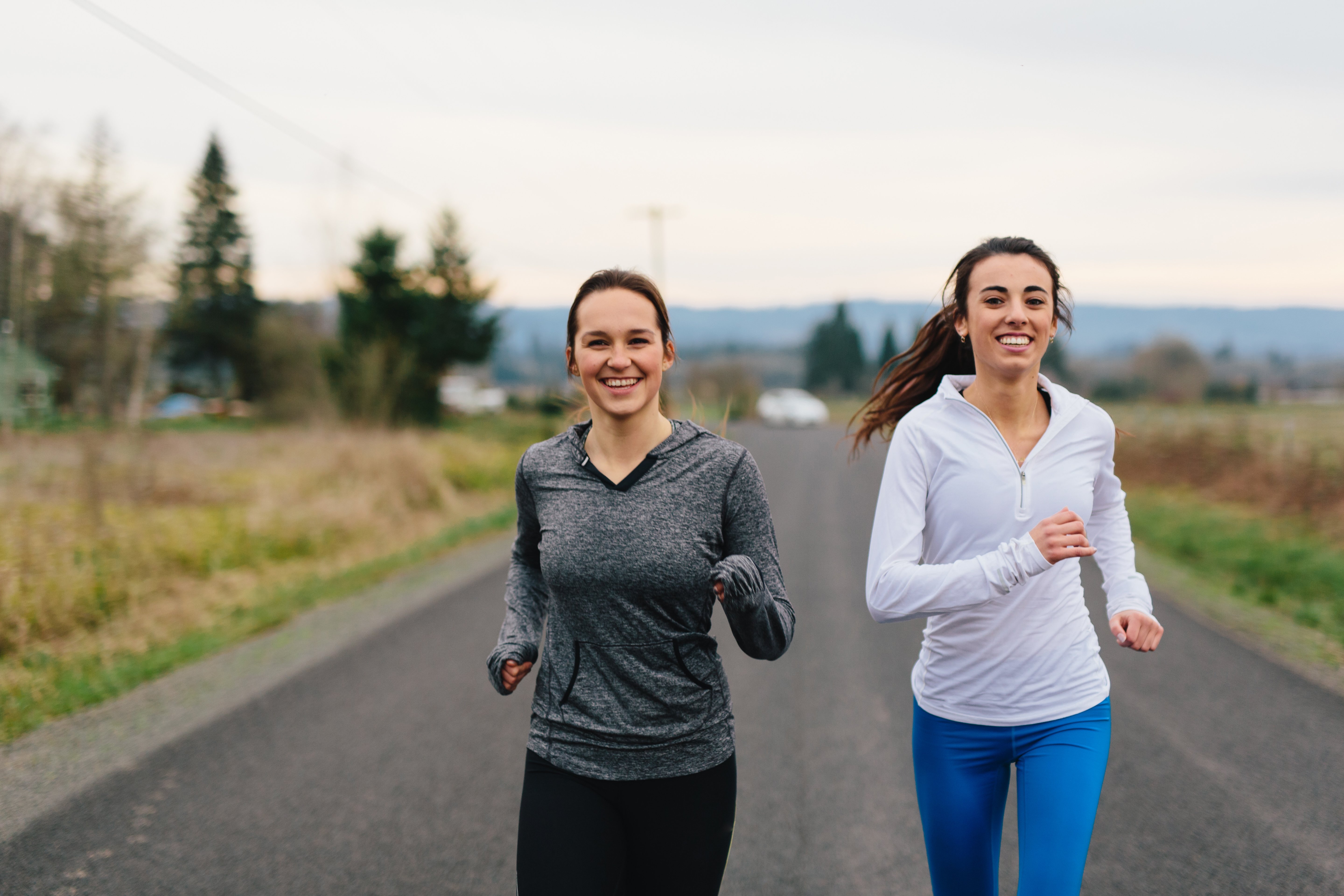 Running Women Jogging in Country