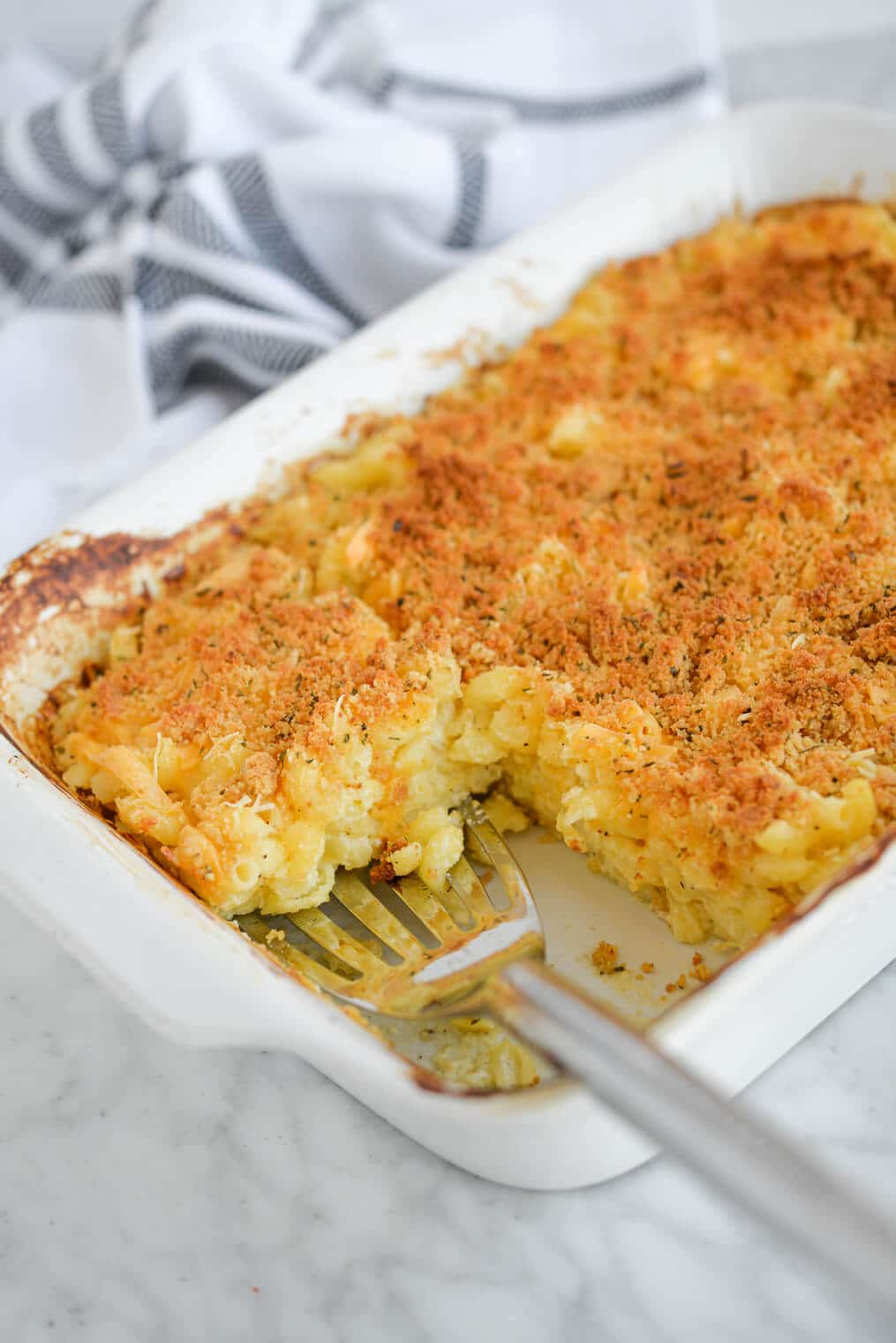 homemade mac and cheese baked in glass bowl