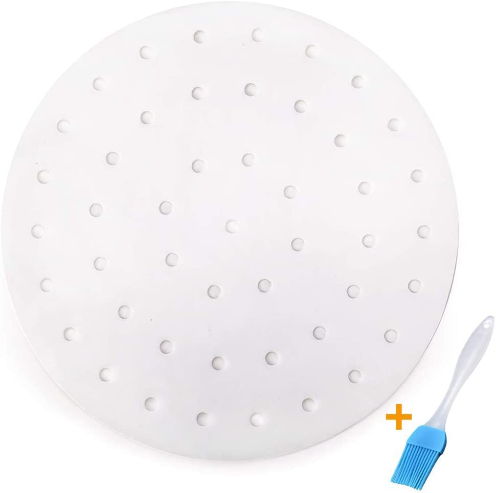 white parchment paper circles with small holes