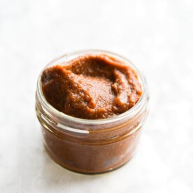 a small mason jar filled with tamarind paste