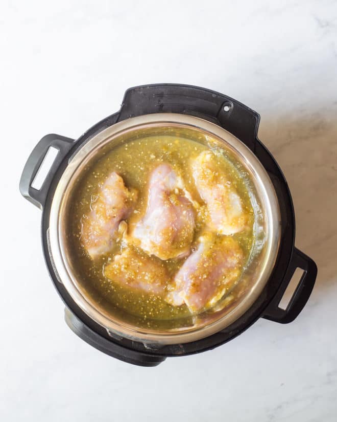 chicken thighs and salsa verde in an instant pot