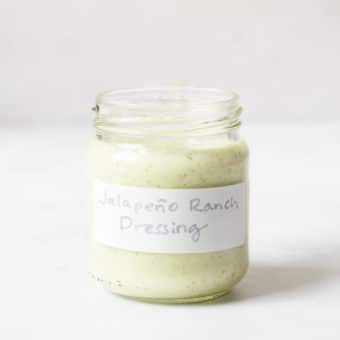 a small labeled jar filled with jalapeno ranch dressing