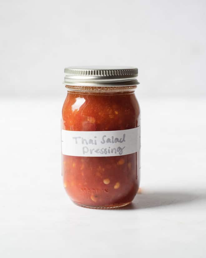 homemade thai salad dressing in a labeled mason jar