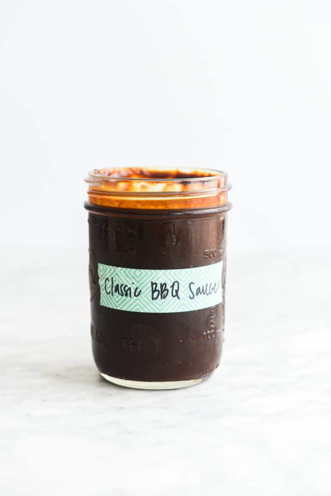 a labeled mason jar of classic bbq sauce
