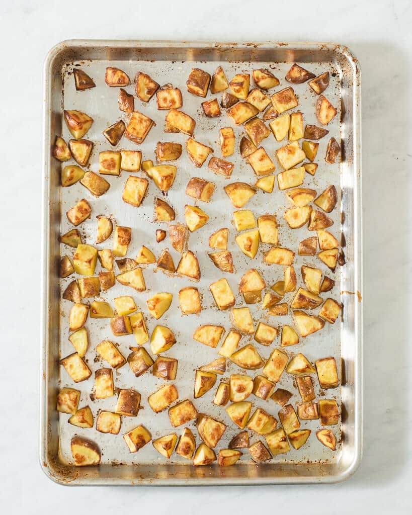 a sheet pan of cubed roasted potatoes