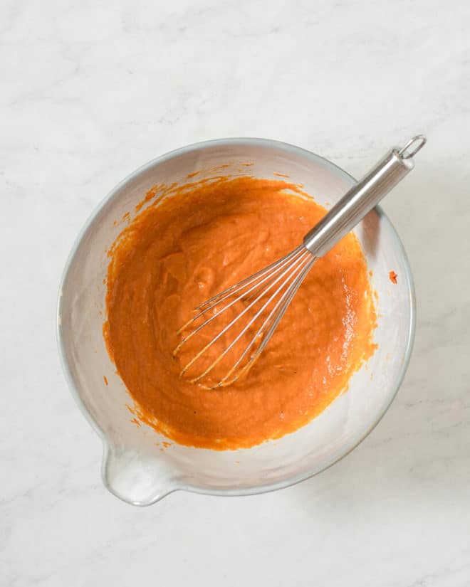 pumpkin bread batter in a large mixing bowl