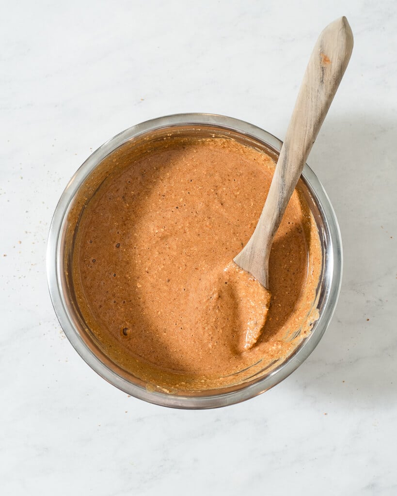 a metal bowl of keto pumpkin bread batter