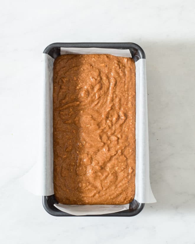 a loaf of keto pumpkin bread (before being baked) in a loaf pan