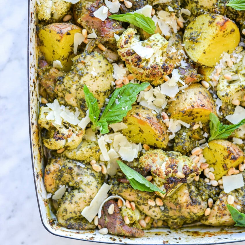 a chicken pesto bake in a casserole dish