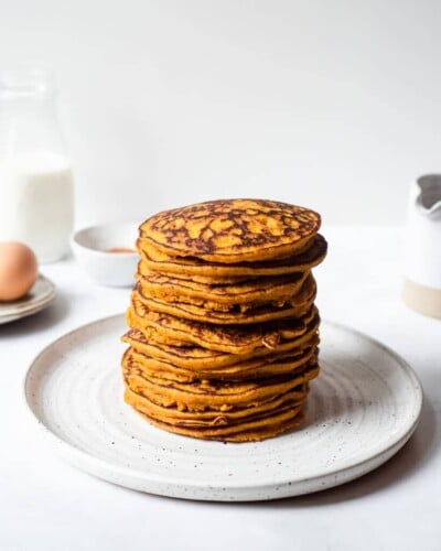 a stack of pumpkin pancakes on a plate