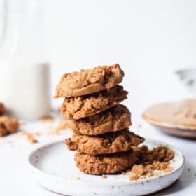 a stack of keto peanut butter cookies on a plate