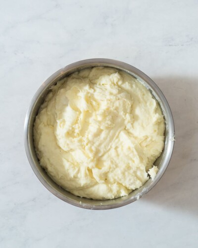 a mixing bowl of creamy mashed potatoes
