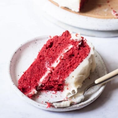 a piece of red velvet cake on a small plate