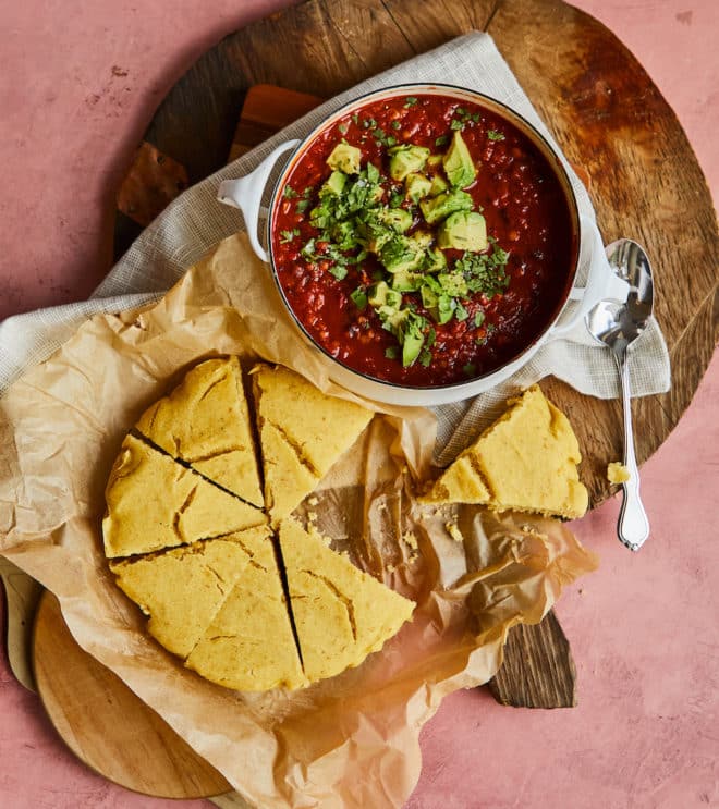 veggie chili next to a batch of vegan cornbread