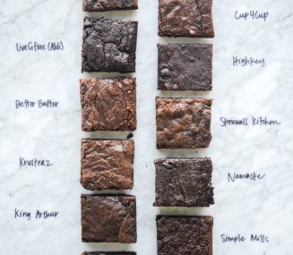 11 different boxed brownies on a marble surface, all clearly labeled