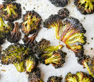 roasted broccoli florets on a sheet pan